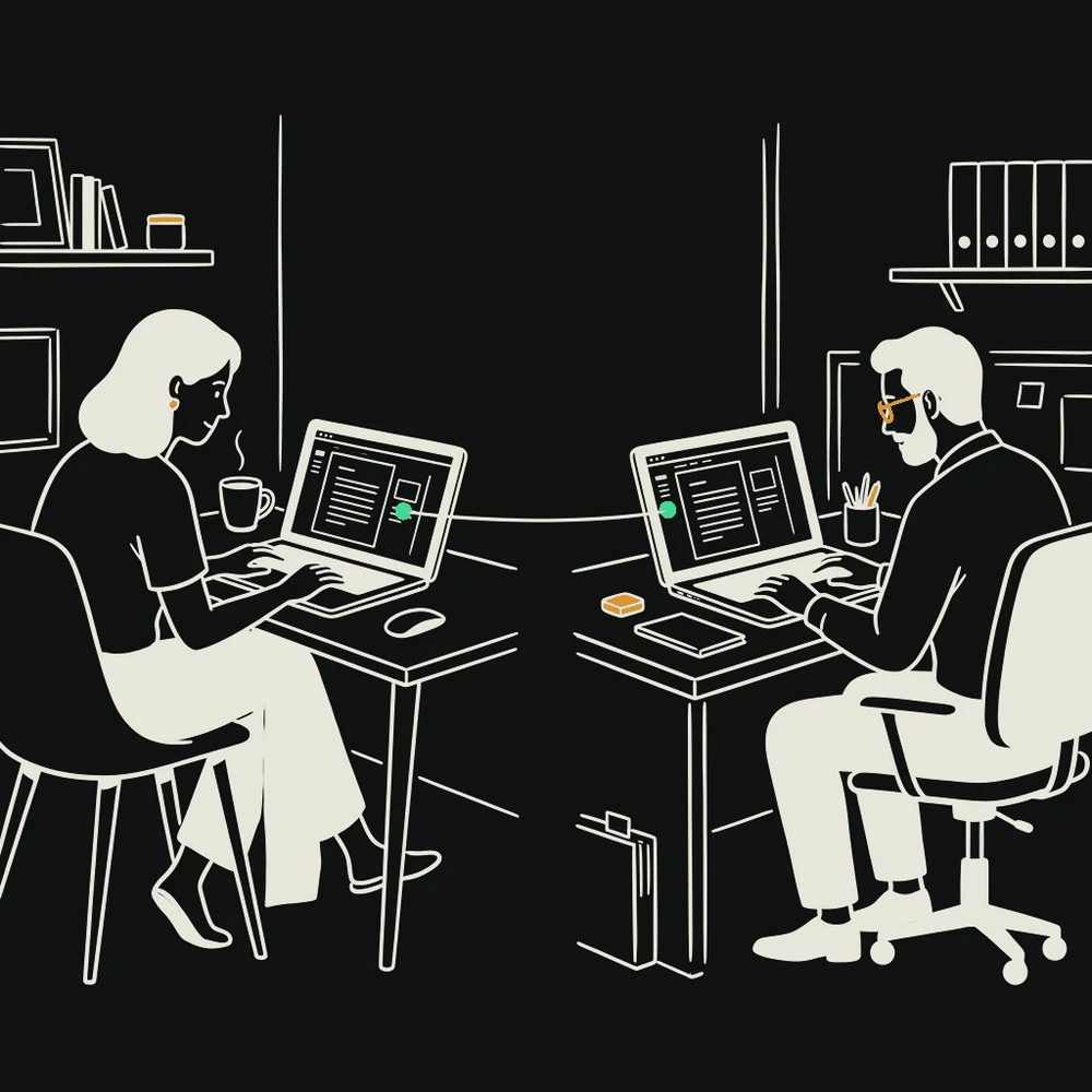 Two people at desks in different places, each with the same document open on their laptop, joined by a single line across the middle.